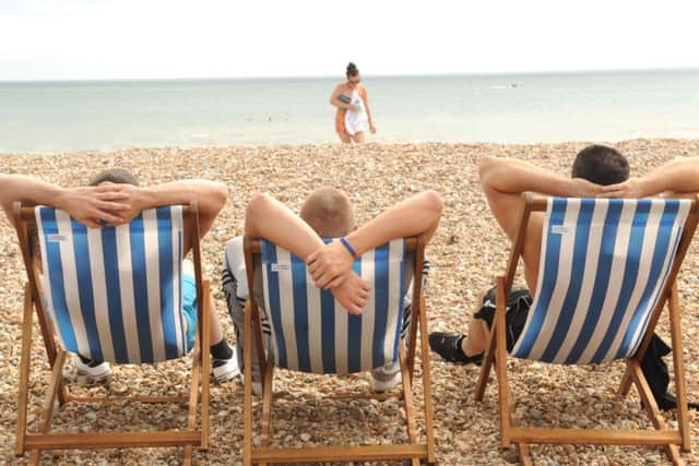 Lads, just being lads!  - Relaxing on Bognor beach