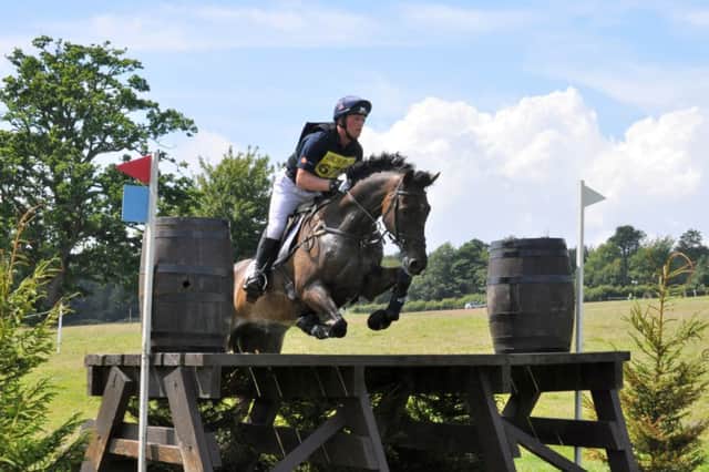 Oliver Townend clears a fence at the Reverdy Brightling Park International Horse Trials. Picture courtesy Spidge Photography