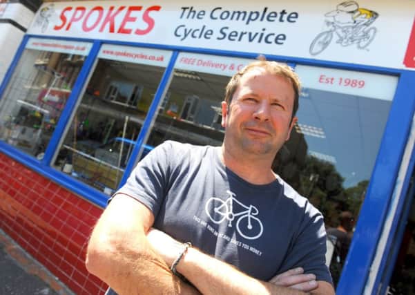 WH 140714 Business suffering from street drinkers. Andrew Sleeman, of Spokes Cycles, in Beach Road, Littlehampton. Photo by Derek Martin