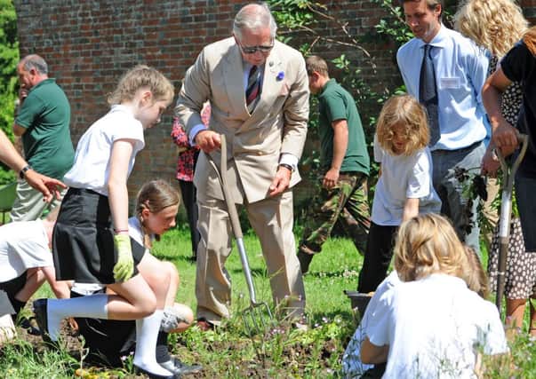 SH 180714  Prince Charles meets Steyning Primary School children while visiting Wiston House. Photo by Derek Martin. SUS-140718-172204001