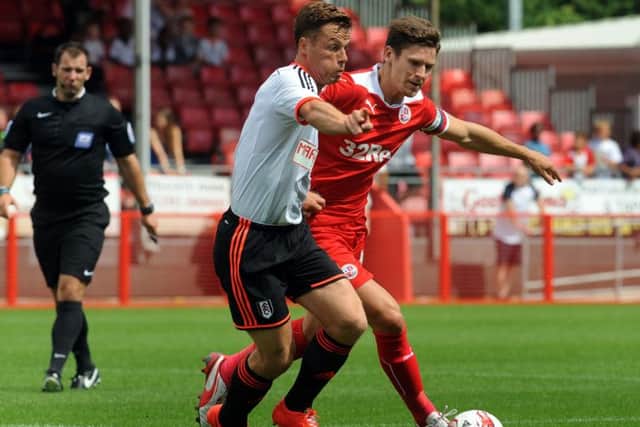 Crawley V Fulham - Josh Simpson and Scott Parker battle for possesion (Pic by Jon Rigby) SUS-140719-194731002