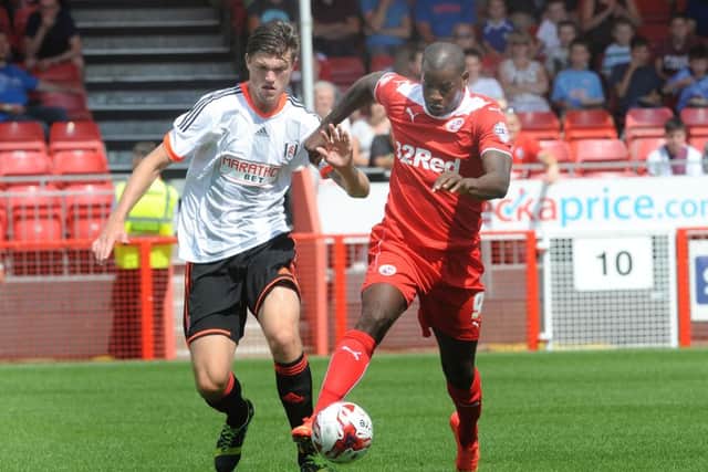 Crawley V Fulham - Izale McLeod takes on the Fulham defence (Pic by Jon Rigby) SUS-140719-194820002