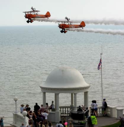 Wingwalkers at 1920s event Bexhill July 2014 SUS-140722-141550001