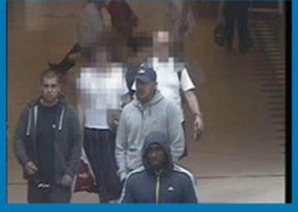 CCTV image of men police would like to question.