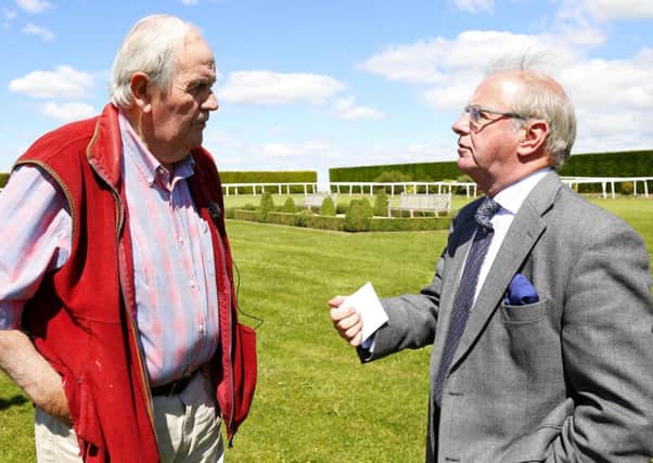 Seamus Buckley with Richard Hannon senior, pictured during Goodwood's visit to the Hannons' Herridge yard   Picture by Dan Abraham / Goodwood Racecourse