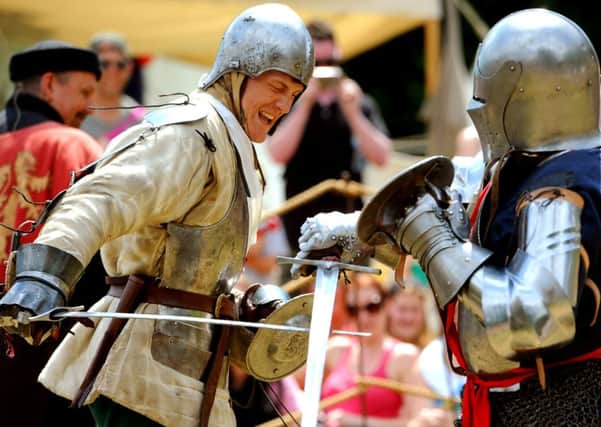 Knights clashing their swords at Arundel Castle