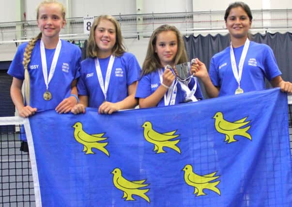 The victorious Sussex under-12 tennis team with Saffron Dowse far right