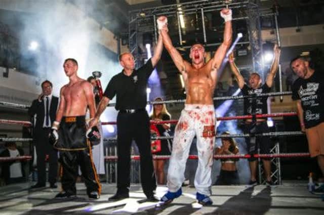 Jimmy Killick celebrates his victory at Tiger Hart Promotions' Pantheon 5 - Requiem. Picture courtesy Flashback Photography Sussex