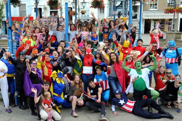JPCT 310714 S14320304x Horsham.  Superheroes invade town centre. Holiday club at bandstand -photo by Steve Cobb SUS-140108-115010001