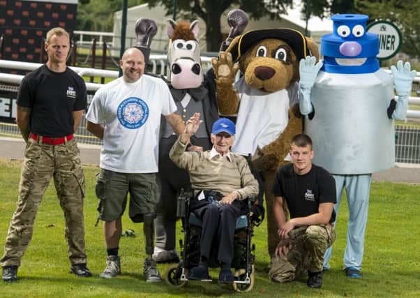 Mascots and supporters gather for their challenge at Fontwell Park  Picture by Darren Cool / Connors