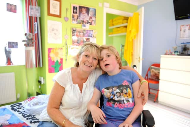Molly Green. 12, pictured in her new room alongside mum Nichola                                                          D14321153a