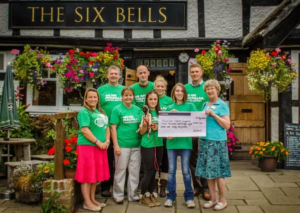Six Bells Billingshurst cheque presentation annual summer charity day raises more than £7,000 for Macmillan Cancer Support (submitted/photo by Dave Dyer photography)