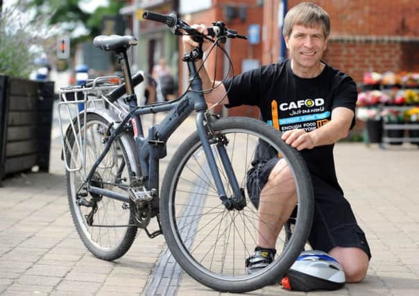 JPCT 050814 S14321484x Billingshurst. James Marchant is cycling the Ride London-Surrey 100 cycle ride for Cafod -photo by Steve Cobb SUS-140508-122939001
