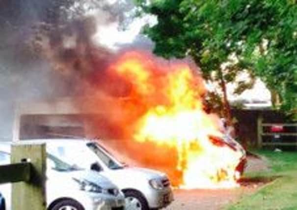 The minibus engine engulfed in flames. Picture: Daniel James Parsons