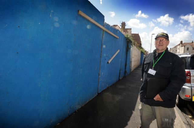 Cllr Charles Clarke pictured outside the old Grand Hotel site, Sea Road, Bexhill. 11/8/14 SUS-141108-140604001