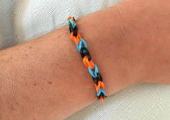 A 'cure cancer bangle' given to Tim by his daughter