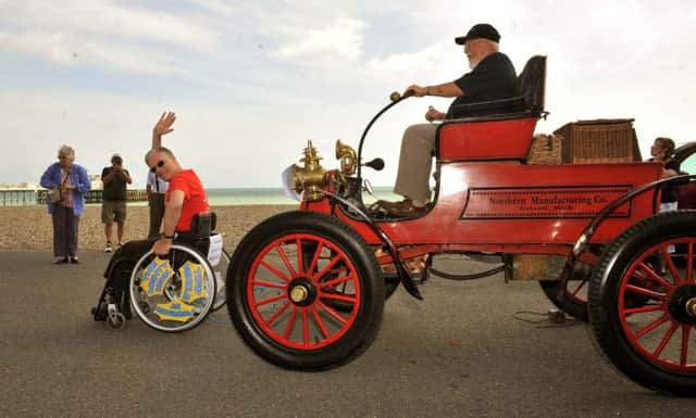 W32656H14

Hydrocephalus sufferer Kevin  Harmer doing his veteran car pull on Worthing Sea Front on Saturday SUS-141108-102655001