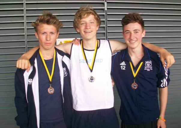 Seaford medallists at the county finals: Anton Austin, Harry Marchant and James King