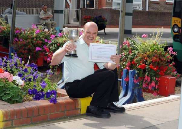 Littlehampton railway station is no stranger to winning awards. Pictured is Sean Morris after the station won one of the town council's gardening awards in 2012