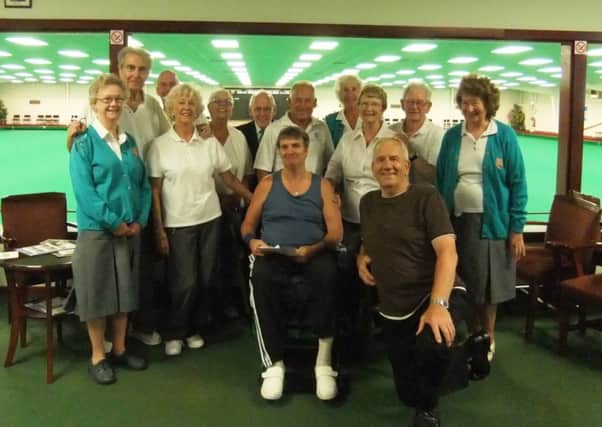Adur Indoor Bowls Club members with Gary Allen, centre