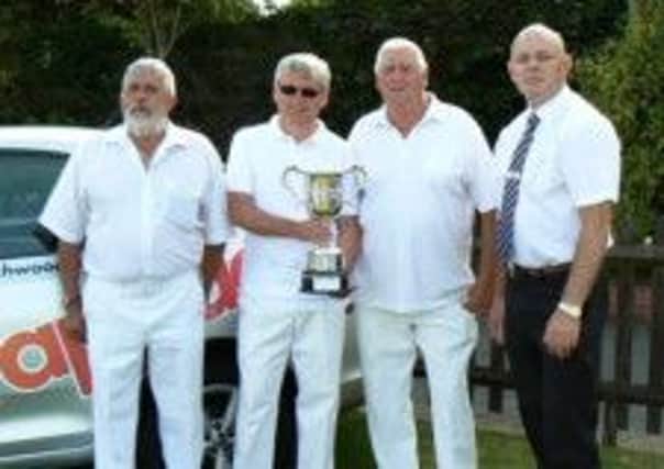 Derek Deeprose, John Southgate and Mick Deeprose, winners of the triples at the 2014 Bexhill Men's Open Bowls Tournament, with David Fletcher, of tournament sponsors The Birchwood Group