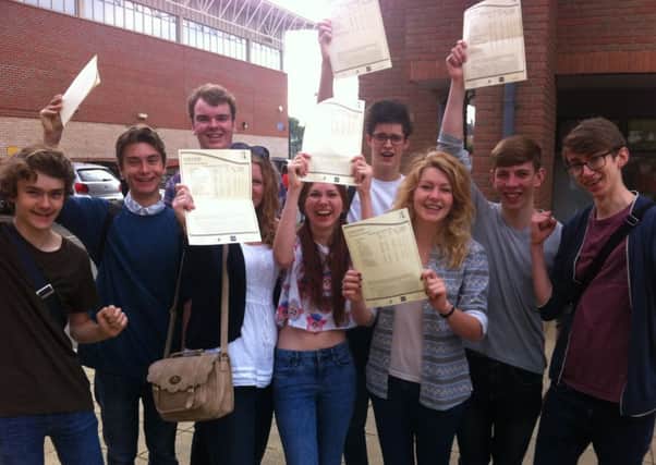 Students celebrate their A-level results at Collyer's college in Horsham
