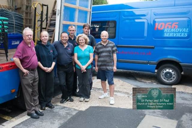 Bexhill Lions and 1066 Removals sending chairs to Belarus, Russia SUS-140814-150650001