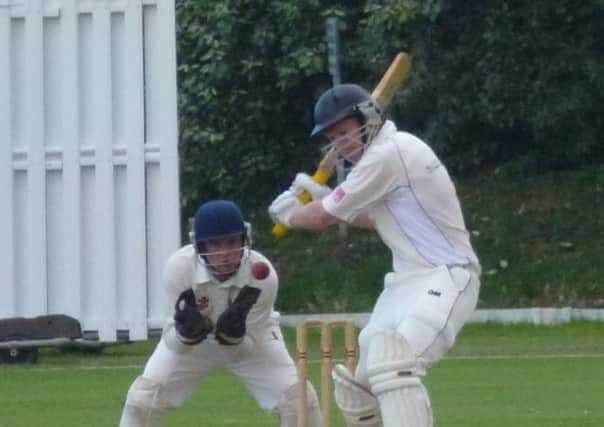 Leigh Harrison (batting) took 5-39 for Roffey against Bexhill