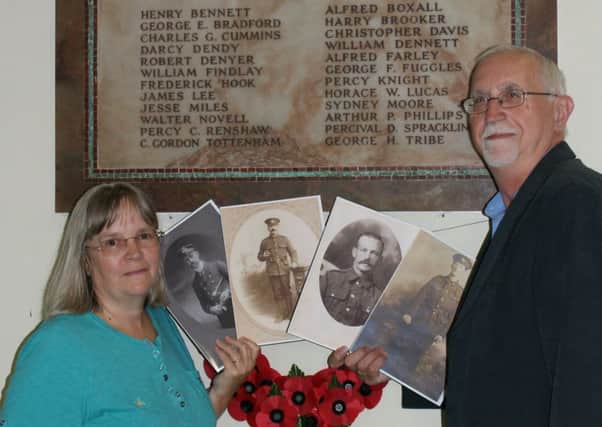 two researchers (Merve Goddard and Mary Hallett) at the War Memorial in Itchingfield church Barns Green WW1 commemmoration project gets Lottery funding (submitted).