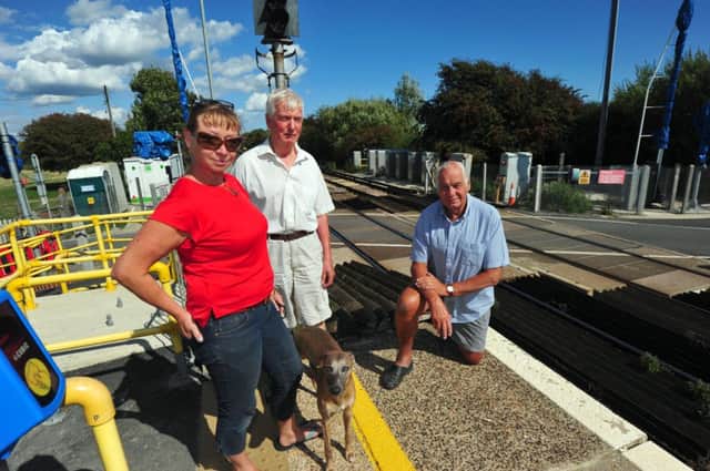 Normans Bay residents concerned by plans to automate the Normans Bay railway crossing.  Jenifer Corker, Nick Munro and Michael Mortlock