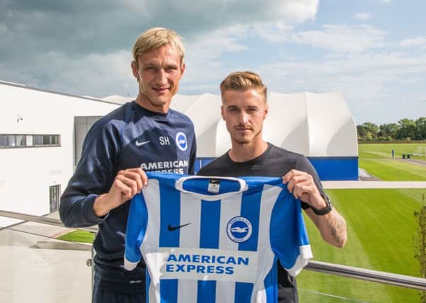 Joe Bennett with Albion boss Sami Hyypia. Picture by Geoff Penn
