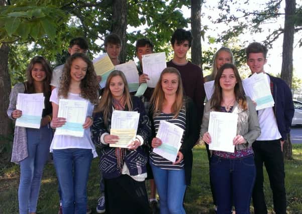 Some of the top students at Steyning Grammar School with their results
