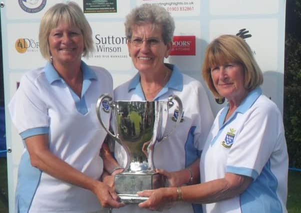Polegrove ladies Denise Hodd, Mary Williams and Lorraine Hume with their trophy for reaching the final of the national triples competition at Royal Leamington Spa