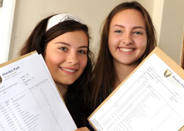 Morwenna Rickard and Thecla Todd-Randall at Warden Park with their GCSE results. Pic Steve Robards SUS-140821-131243001