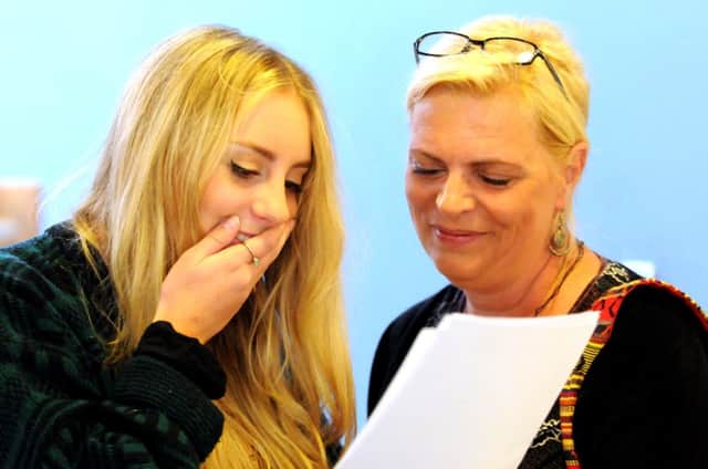 GCSE results day at Oakmeeds. Ellen Shaw with her mother. Pic Steve Robards SUS-140821-131338001