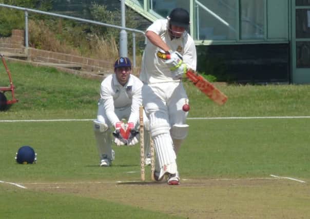 Elliot Hooper plays a pull shot for Hastings Priory against Cuckfield last weekend which actually struck the square leg umpire. Picture by Simon Newstead (SUS-140816-231636002)