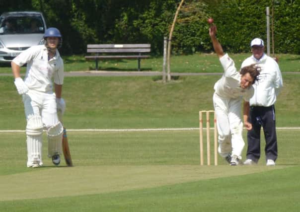 Joe Cox bowling for Bexhill during their defeat at home to Sussex Premier League leaders Roffey last weekend. Picture by Simon Newstead (SUS-140816-232645002)
