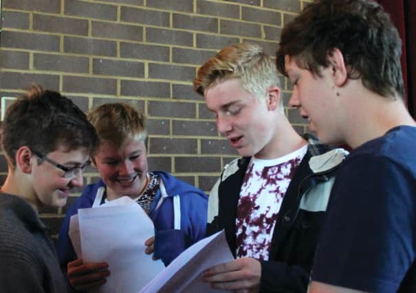 Students reading their results