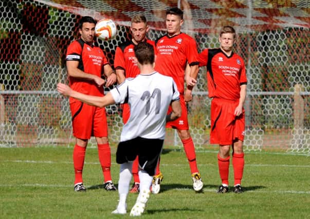 Hassocks (red) v Loxwood. Pic Steve Robards SUS-140823-212921001