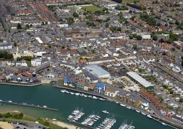 111872_AERIALS_21/06/11

Aerial view of Littlehampton and the river Arun.
 
Picture: Allan Hutchings (111872-299) ENGPPP00120110622124808