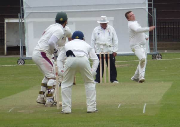 Liam Bryant bowling for Bexhill's first team earlier this season. Picture by Simon Newstead (SUS-140615-182447002)