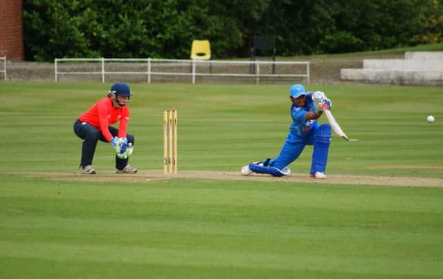 Carla Rudd keeping wicket for the England Academy side against India
