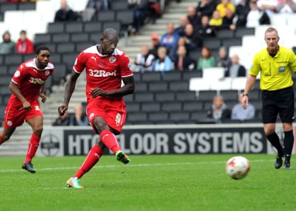 Crawley's Izale McLeod misses from the penalty spot against MK Dons (Pic by Jon Rigby) SUS-140830-182900002