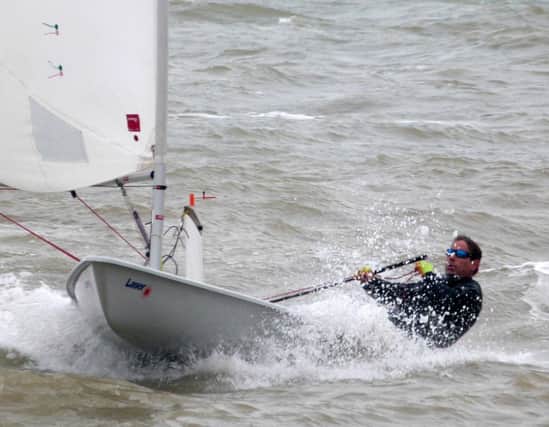 Hugh Ashford, winner of best placed local sailor trophy in the Hastings & St Leonards Laser Open, at full speed