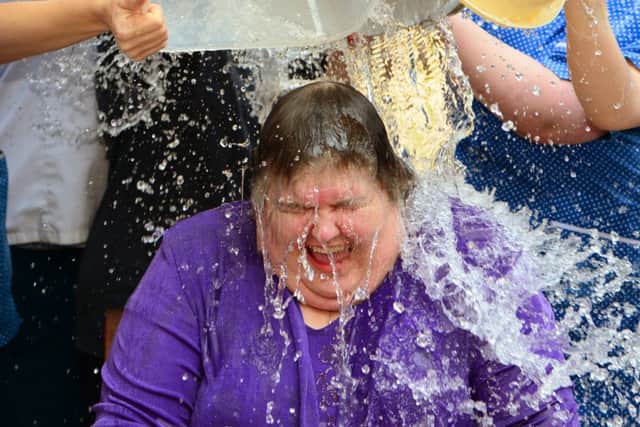 Care home manager Jackie Cox gets a soaking during the Ice Bucket Challenge D14351379a