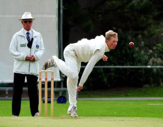 Shawn Johnson bowling for Bexhill during their draw at home to East Grinstead last weekend. Picture by Steve Hunnisett (SUS-140830-184457002)