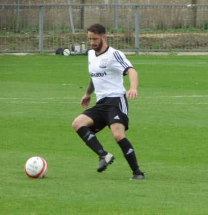 Andy Garman on the ball for Bexhill United in the Sussex County FA RUR Charity Cup second round tie away to Lancing last weekend. Picture courtesy Mark Killy