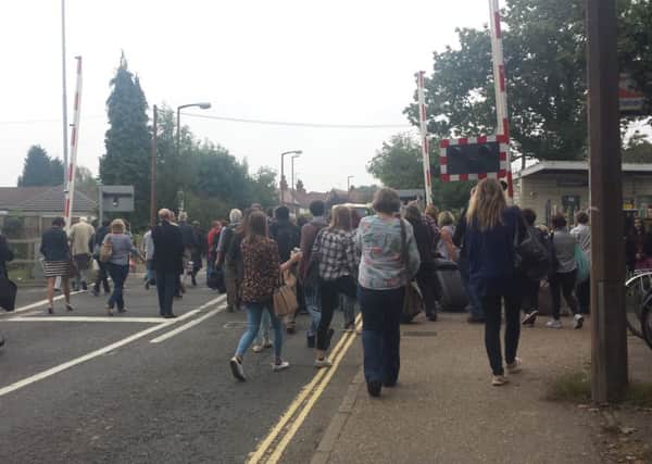 Passengers at Littlehaven station after a train was turned back at Crawley following the fatality on the line. Photo: Joshua Powling.