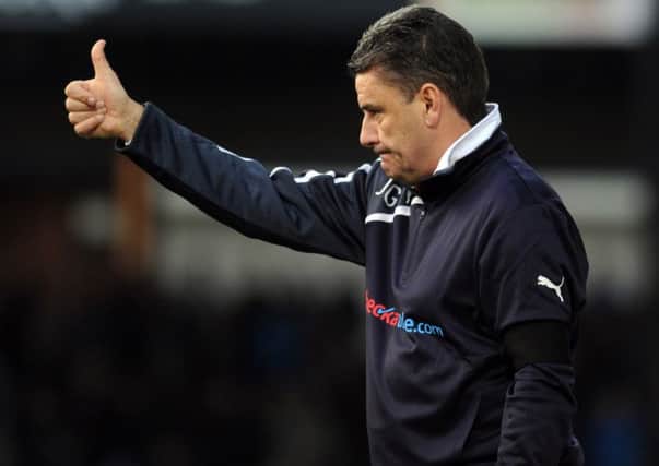John Gregory shouts instructions during his first game in charge of Crawley Town who drew 0-0 at Bristol Rovers in the FA Cup ENGSUS00220130812222137