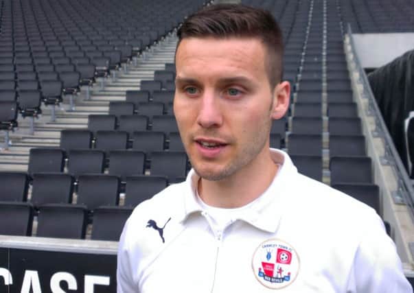 Crawley Town defender Mat Sadler after completing his 200th consecutive league appearance SUS-140413-171013002